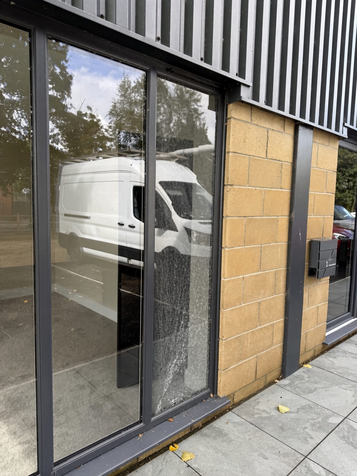 Broken sealed glass unit before replacement – commercial window repair Norfolk